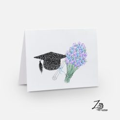 Grad cap with scroll and bouquet